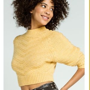 Yellow cropped turtleneck sweater